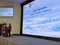 Áslaug Ásgeirsdóttir giving a speech