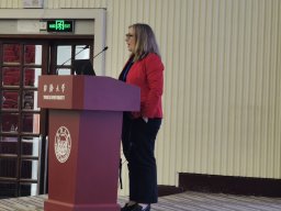 Áslaug Ásgeirsdóttir giving a speech - closeup